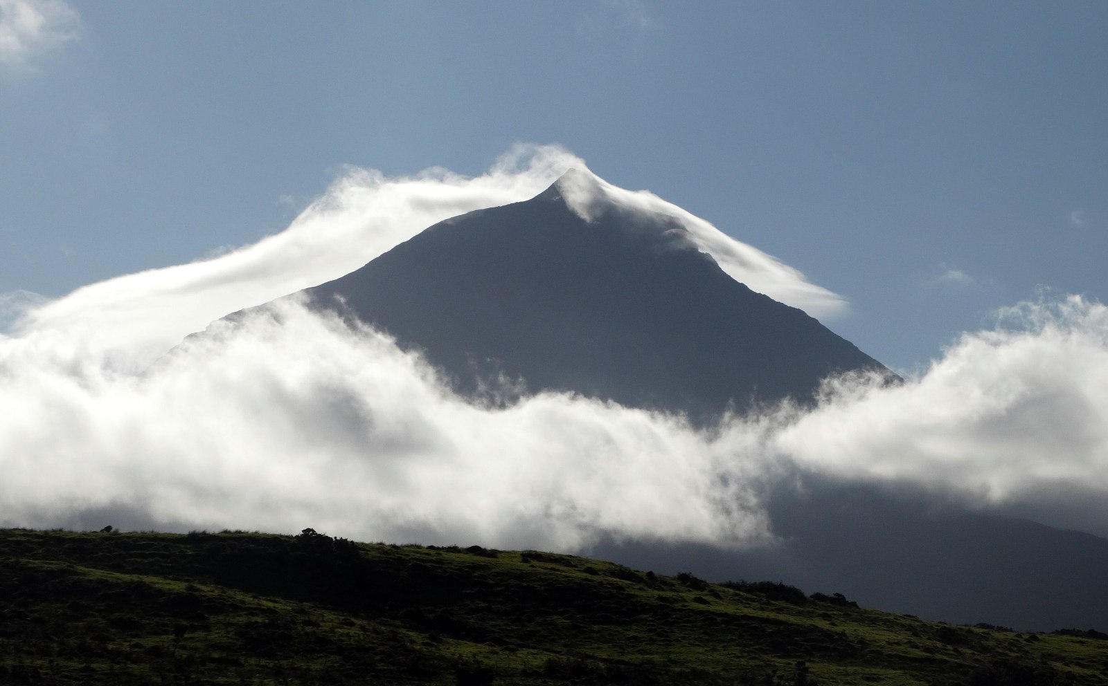 Pico Peak rising above the clouds